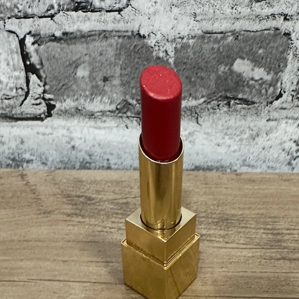 EUC Yves Saint Laurent Black and Gold Lipstick